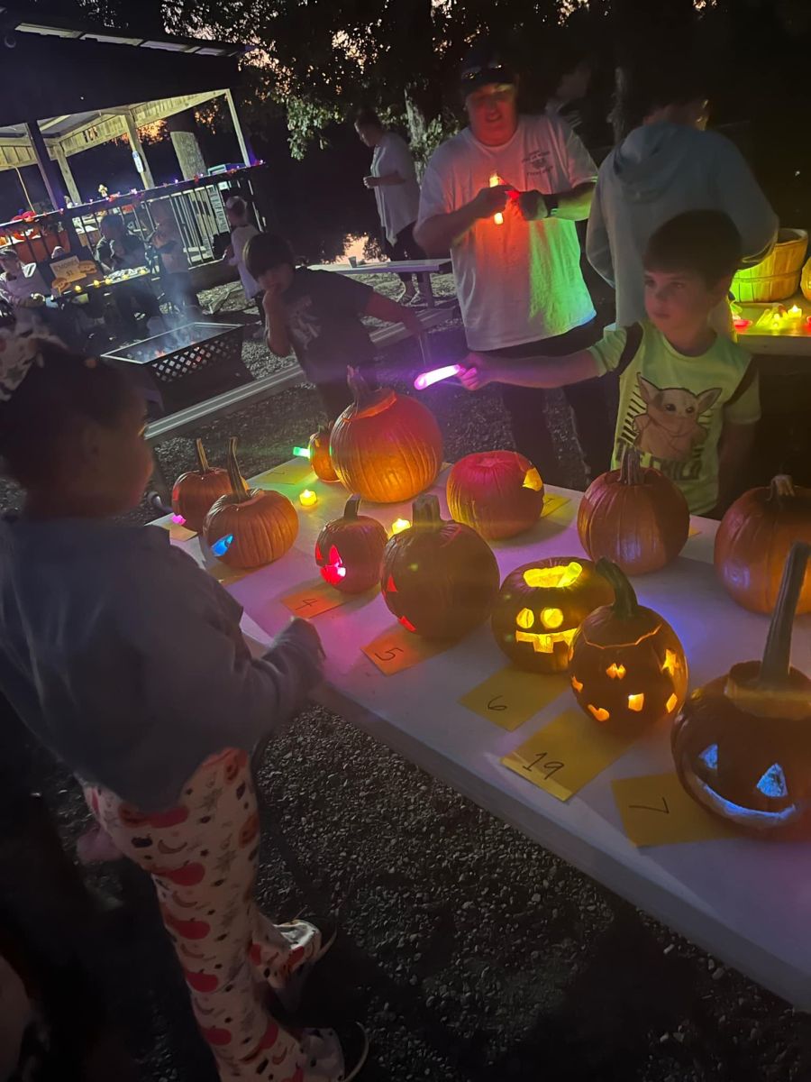 getting pumpkins lit up for floating