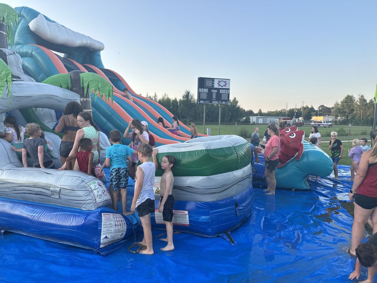Kids beating the heat with the waterslides