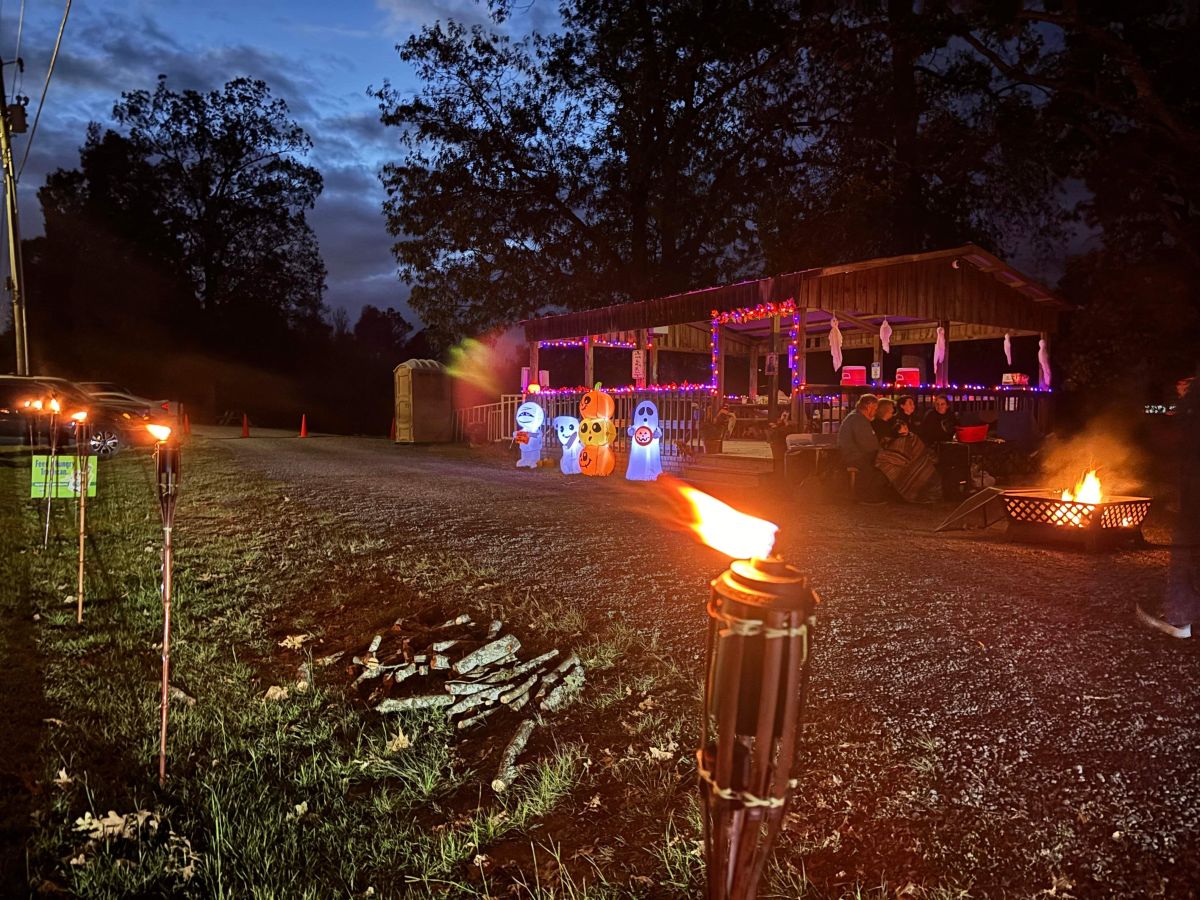 Tiki torches, fire pit and pavilion for Pumpkin Float