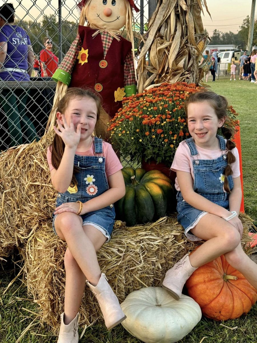 Twin girls enjoying Harvest Fest